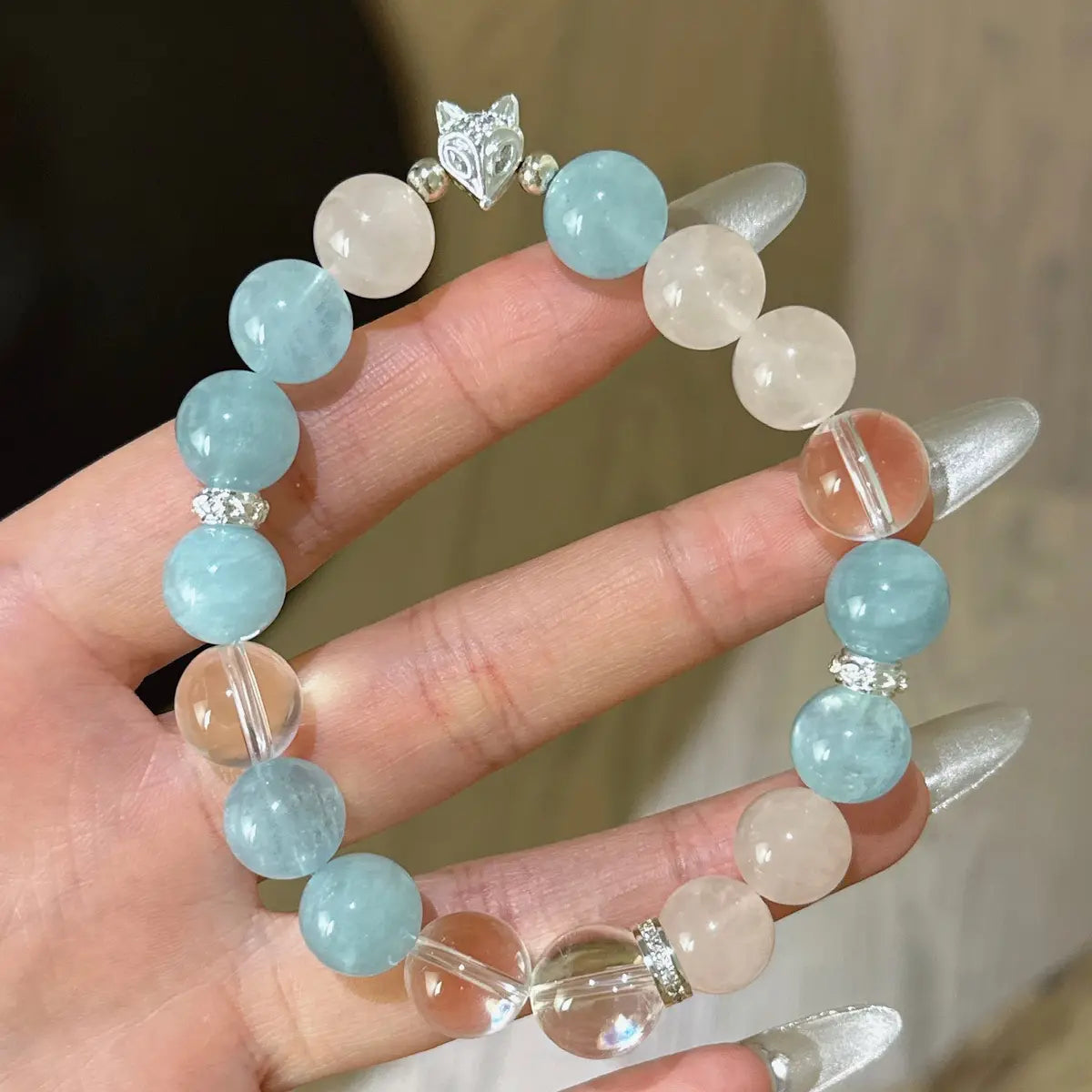Handcrafted aquamarine; rose-quartz Detail for Love - Astara