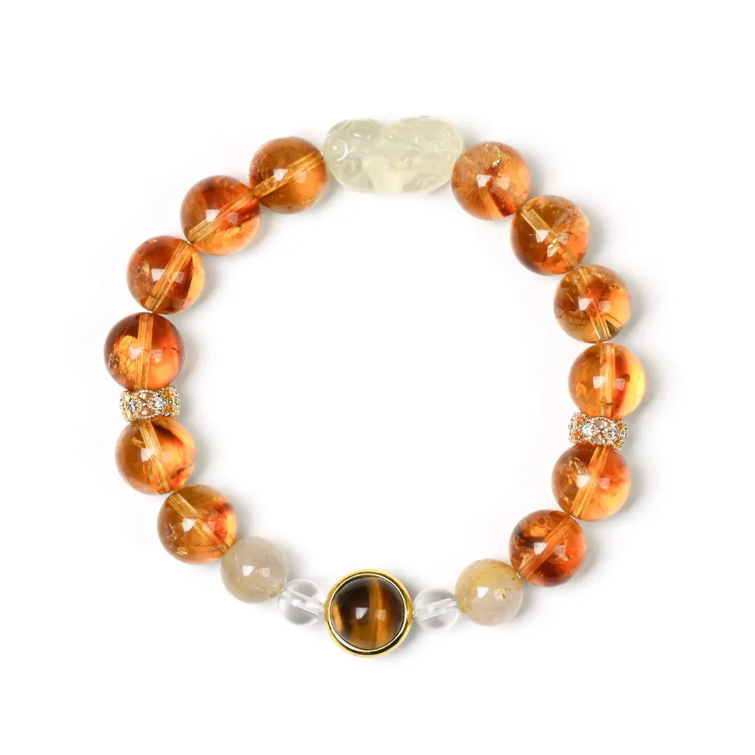 citrine-crystal; clear-quartz; golden-rutilated-quartz; tigers-eye Abundance Crystal Jewelry - Golden Ascend Power Bracelet | Astara