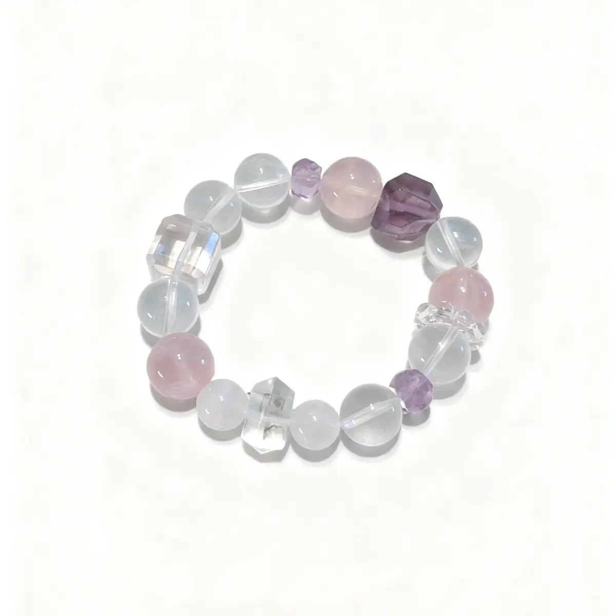 rose-quartz; amethyst; clear-quartz; white-phantom-quartz Love Crystal Jewelry - Harmonia Rose & Clear Quartz Bracelet | Astara