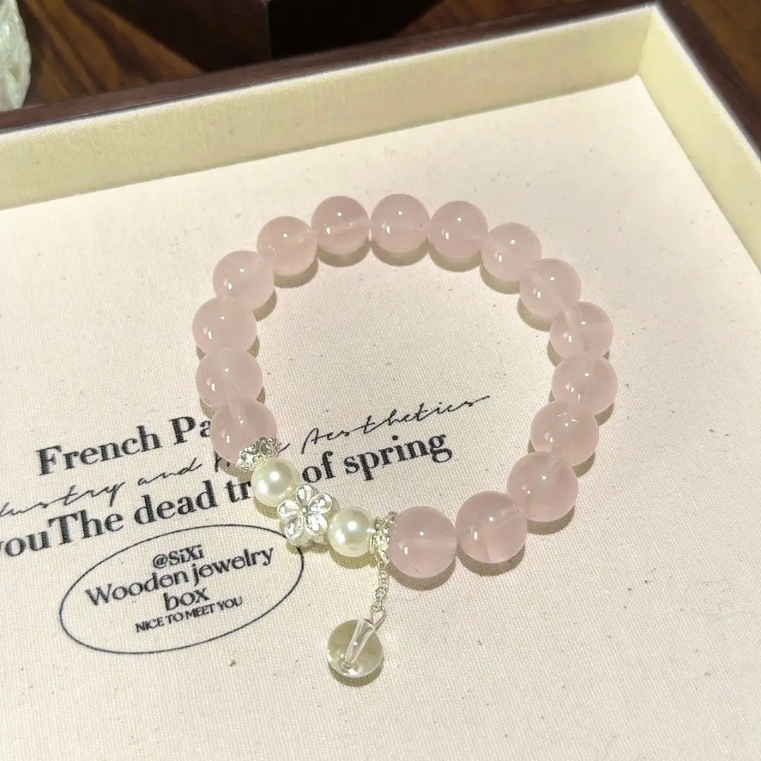 Handcrafted rose-quartz; shell-pearl; silver; clear-quartz Detail for Love - Astara