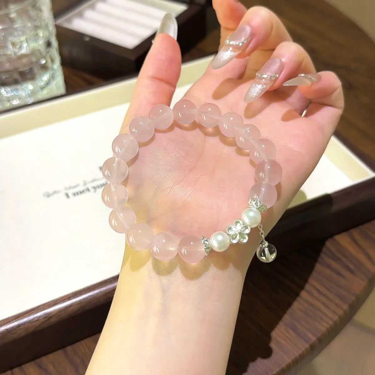 Handcrafted rose-quartz; shell-pearl; silver; clear-quartz Detail for Love - Astara