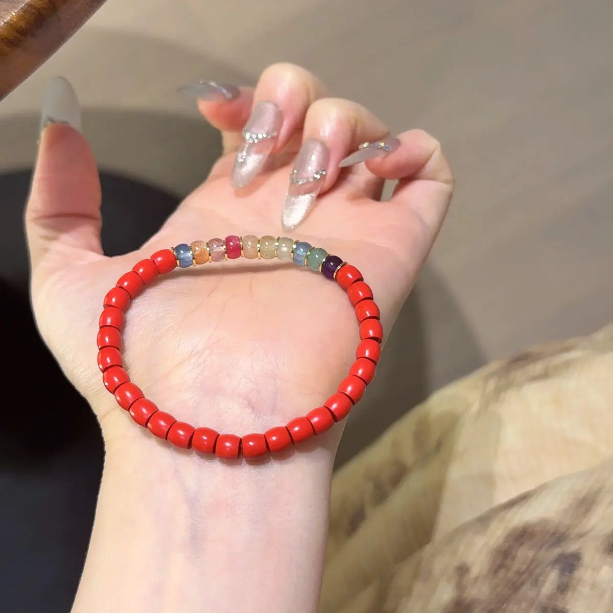 Handcrafted cinnabar; blue-kyanite; strawberry-quartz; rhodonite; sunstone; orange-moonstone; golden-rutilated-quartz; amethyst; prehnite-1; green-strawberry-quartz; opal Detail for Abundance - Astara