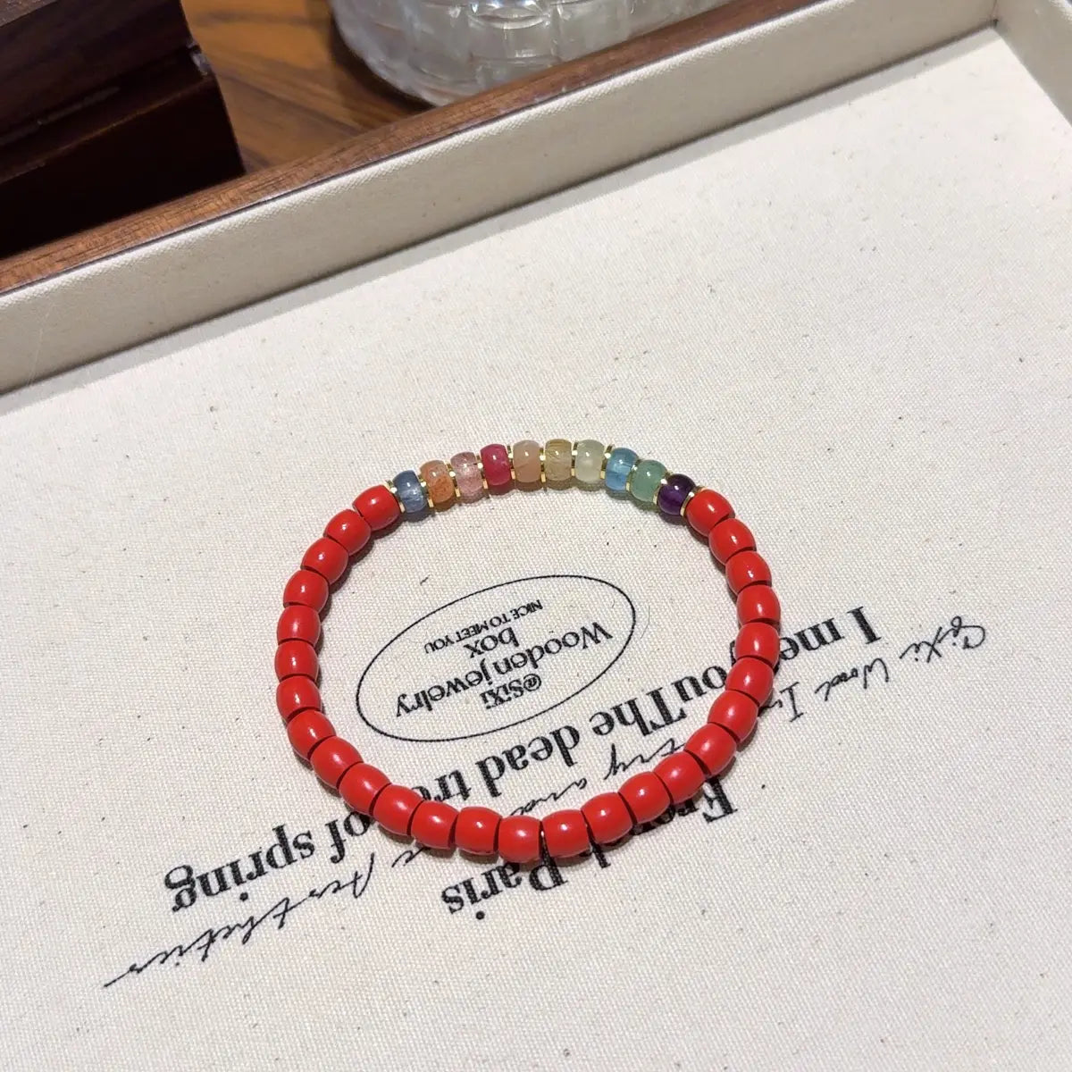 Handcrafted cinnabar; blue-kyanite; strawberry-quartz; rhodonite; sunstone; orange-moonstone; golden-rutilated-quartz; amethyst; prehnite-1; green-strawberry-quartz; opal Detail for Abundance - Astara