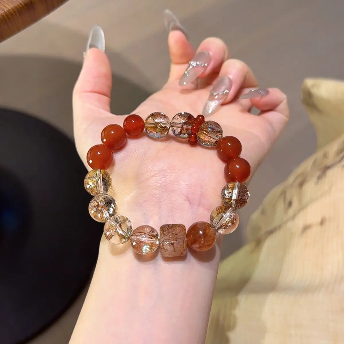 Handcrafted red-hematoid-quartz; agate; black-gold-super-seven; red-rutilated-quartz Detail for Abundance - Astara