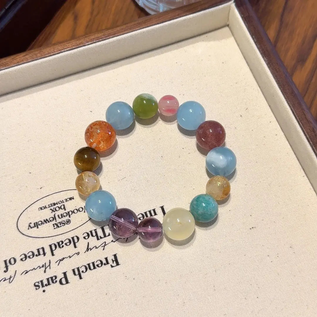 Handcrafted amethyst; aquamarine; jade; amazonite; red-hematoid-quartz; tigers-eye; strawberry-quartz; rhodonite; citrine-crystal Detail for Abundance - Astara
