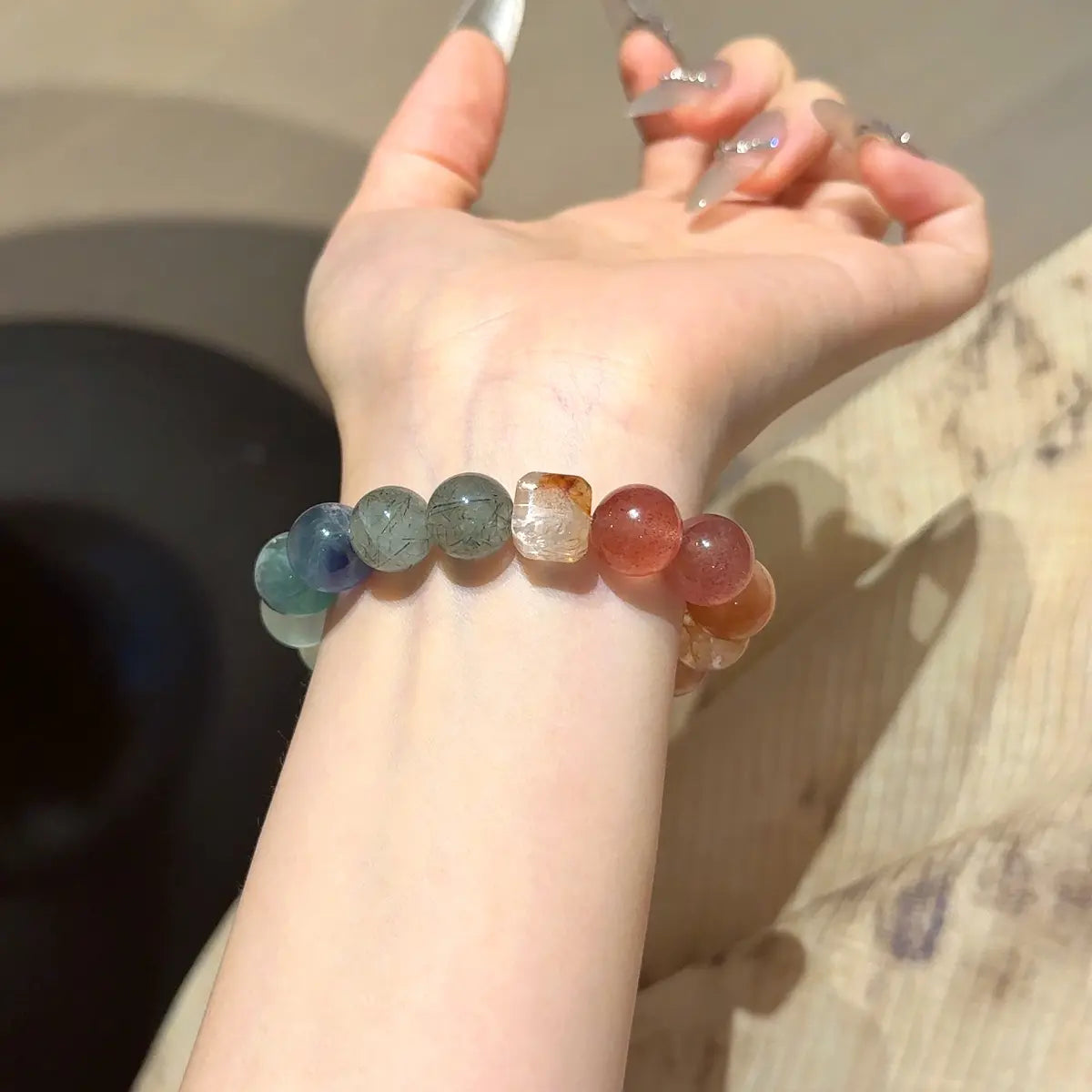 Handcrafted yellow-hematoid-quartz; red-hematoid-quartz; sunstone; strawberry-quartz; yellow-fluorite; green-rutilated-quartz; white-phantom-quartz Detail for Abundance - Astara