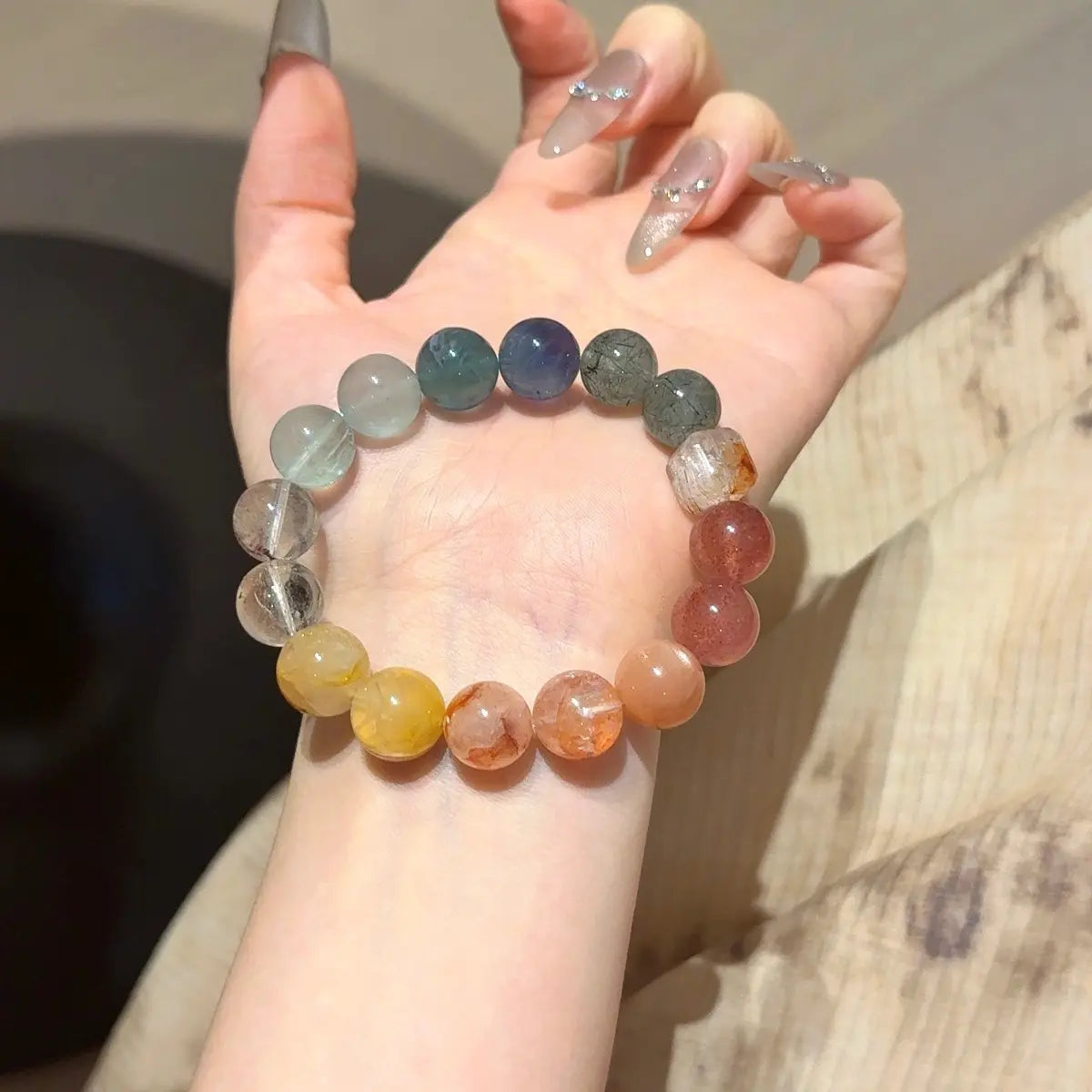 Handcrafted yellow-hematoid-quartz; red-hematoid-quartz; sunstone; strawberry-quartz; yellow-fluorite; green-rutilated-quartz; white-phantom-quartz Detail for Abundance - Astara