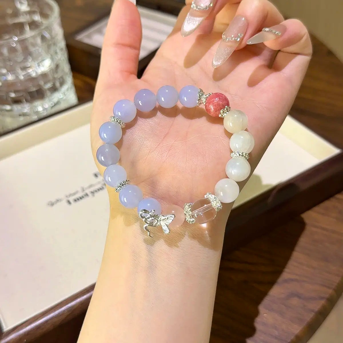 Handcrafted rhodochrosite; white-moonstone; blue-agate; clear-quartz; rose-quartz Detail for Love - Astara