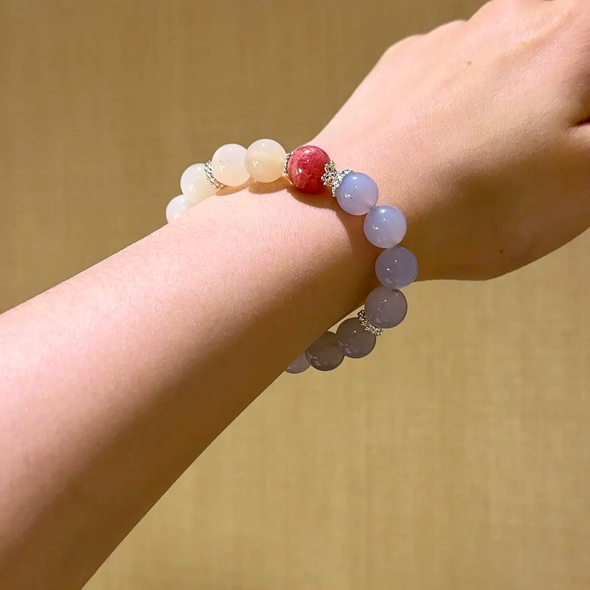 Handcrafted rhodochrosite; white-moonstone; blue-agate; clear-quartz; rose-quartz Detail for Love - Astara