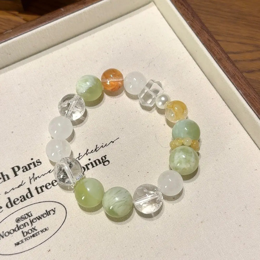 Handcrafted white-azeztulite; yellow-hematoid-quartz; red-hematoid-quartz; clear-quartz; jade; golden-rutilated-quartz Detail for Abundance - Astara