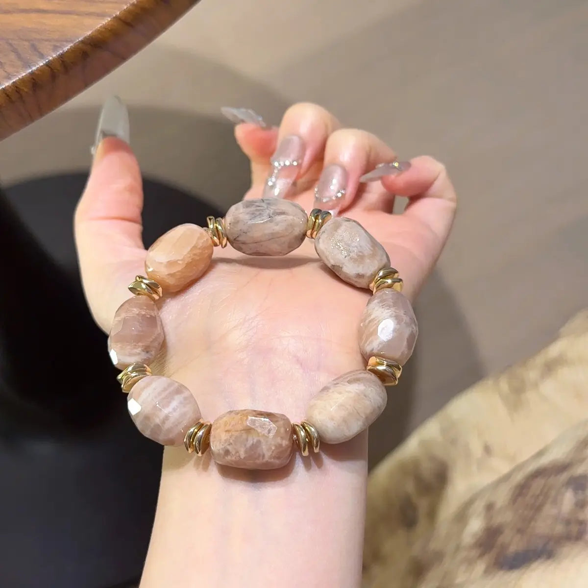 Sunstone freeform bracelet with golden orange sparkle for motivation confidence and wealth energy