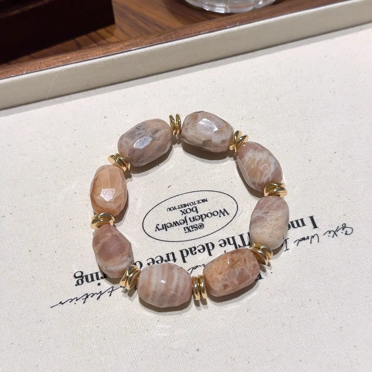 Sunstone freeform bracelet with golden orange sparkle for motivation confidence and wealth energy