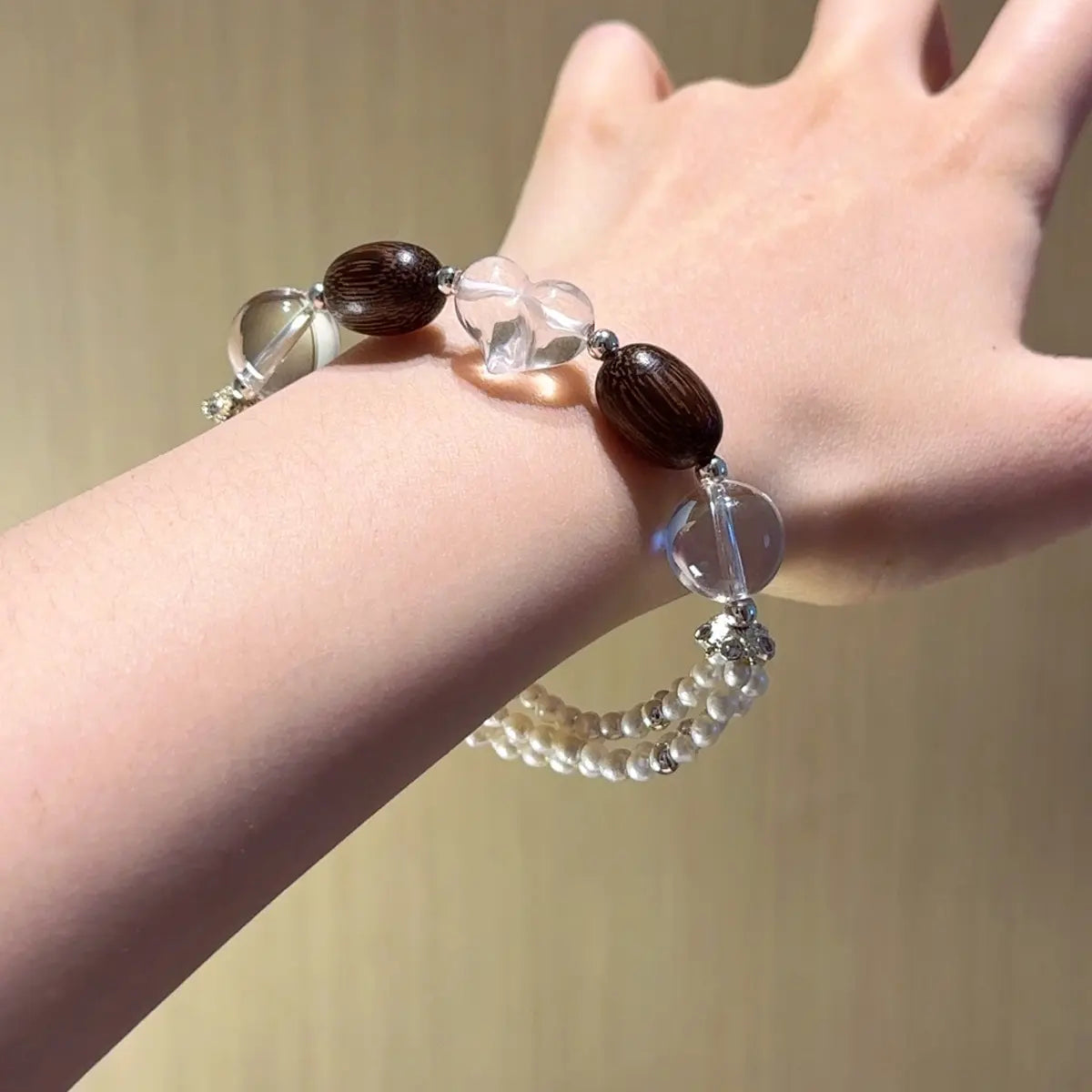 Clear quartz sandalwood and pearl bracelet for emotional healing balance and calm energy