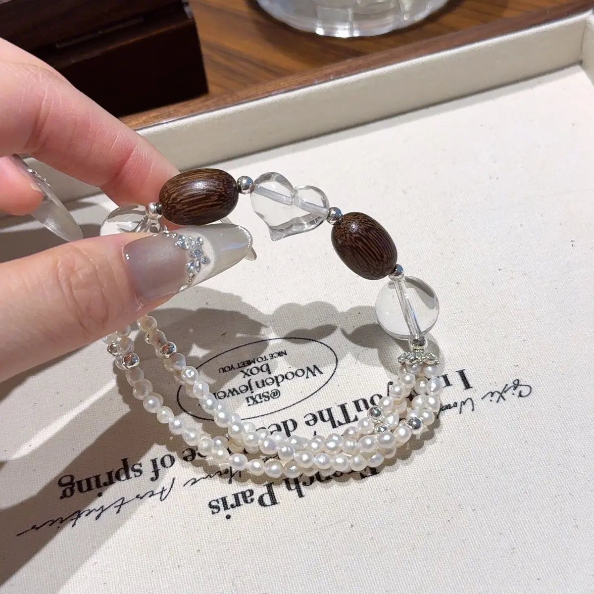Clear quartz sandalwood and pearl bracelet for emotional healing balance and calm energy