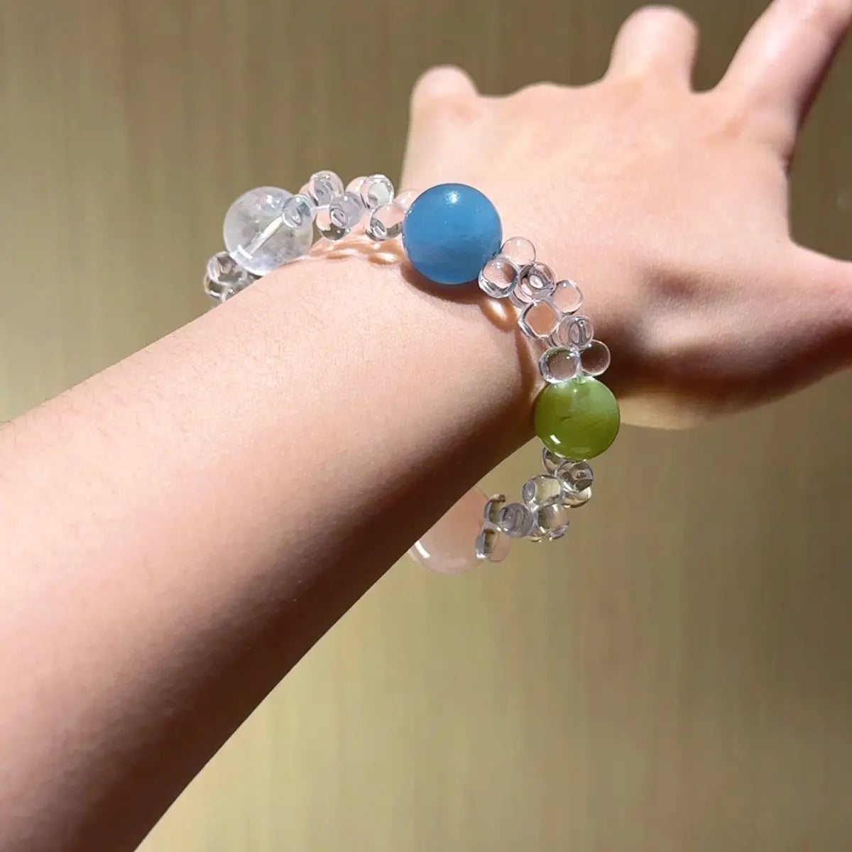 Five element gemstone bracelet with aquamarine tiger eye rose quartz and phantom quartz for balance and luck