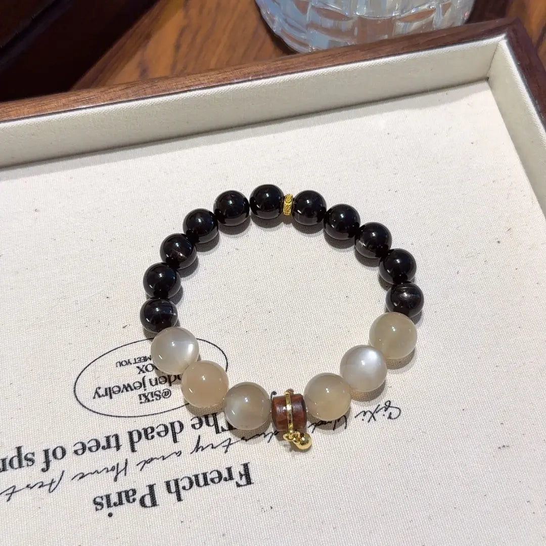 Hypersthene & Peach Moonstone designed for emotional healing, love attraction and relationship protection. Elegant energy jewelry for connection and balance.